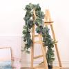 QIAOH Artificial Eucalyptus Garland 15 Pack, Eucalyptus Strand Hanging Fake Eucalyptus Leaves Garland Decoration Green Garland Faux Eucalyptus Garland for Wedding Party Dinner Table view 3