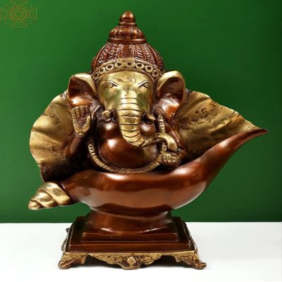Exotic India 15" Ganesha Seated on Conch Pedestal - Brass - Color Brown with Natural Brass