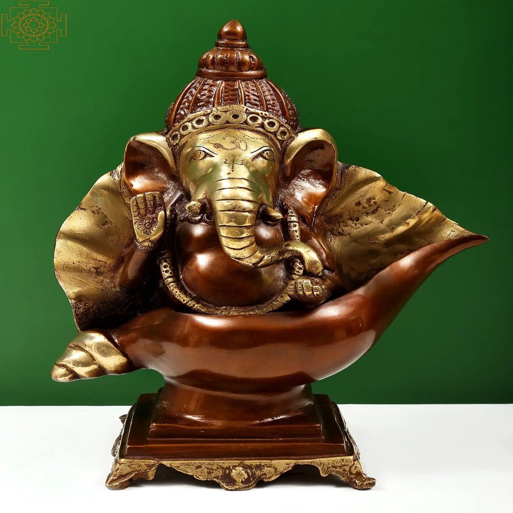 Exotic India 15" Ganesha Seated on Conch Pedestal - Brass - Color Brown with Natural Brass