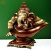 Exotic India 15" Ganesha Seated on Conch Pedestal - Brass - Color Brown with Natural Brass view 2