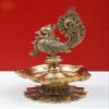 Exotic India 7" Brass Peacock Diya - Brass view 1