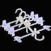 10 PCS Pearl Hangers Artificial Pearl Jeans Shelves Bowknot Wedding Hangers and Trousers Hanging Clip (White),Pearl White view 4