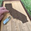 California State Parks push pin map - framed wooden travel tracker map of the California State Parks system with brass pins view 4