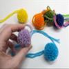 Set of 10 Yarn Pompoms Small 1.5 inch Pom Poms with Tails for Earrings and Crafts (Gold Saffron) view 3