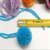Set of 10 Yarn Pompoms Small 1.5 inch Pom Poms with Tails for Earrings and Crafts (Gold Saffron) view 4