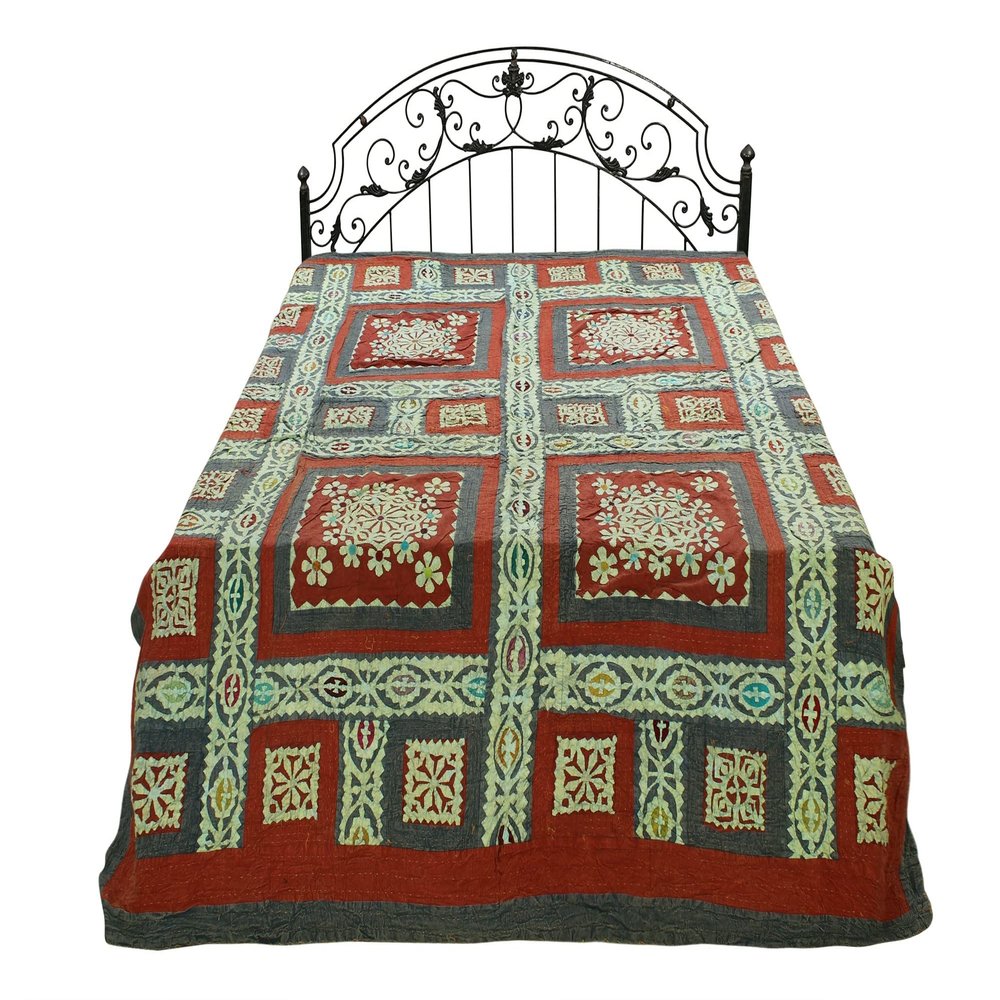 Exotic India Rust Kantha Bedcover with Multicolor Floral Applique Patches from Jodhpur - Pure Cotton
