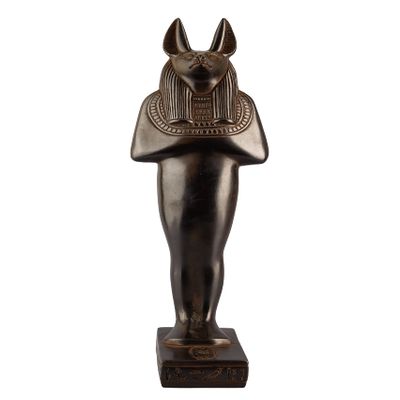 A unique ancient Egyptian statue of Anubis Jackal God of afterlife and mummification standing in form mummy with Jackel head Heavy black stone made in Egypt.