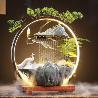 Ceramic Maitreya Buddha Incense Burner, Waterfall Lotus LED Light Ring Backflow Aromatherapy Ornament, with Incense Cones for Home Office Decor for Relaxation Yoga Gift (Peacock)