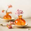 Serene Spaces Living Set of 36 Small Amber Ball Bud Vase, Vintage Glass Bottle Vases for Weddings, Events, Parties, Floral Centerpieces for Home Decor, Measures 3" Diameter & 4" Tall view 3