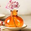 Serene Spaces Living Set of 36 Small Amber Ball Bud Vase, Vintage Glass Bottle Vases for Weddings, Events, Parties, Floral Centerpieces for Home Decor, Measures 3" Diameter & 4" Tall view 4