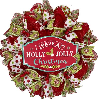 Have a Holly Jolly Christmas Handmade Deco Mesh Wreath. Available in 24 inch and 28 inch diameters