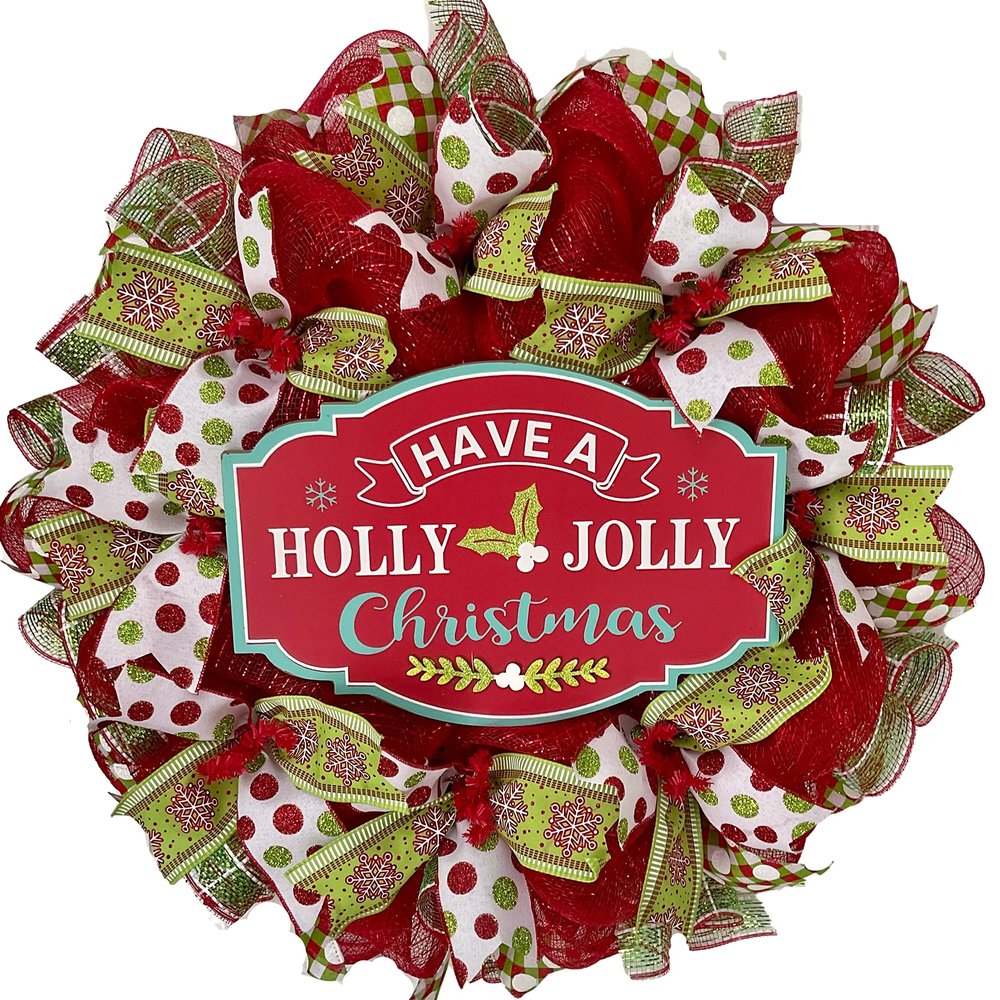 Have a Holly Jolly Christmas Handmade Deco Mesh Wreath. Available in 24 inch and 28 inch diameters
