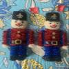 2pk Christmas Themed Tinsel Nutcracker Hanging Wall Decor, 15x6.75 in. view 1
