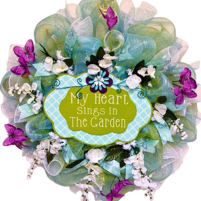 My Heart Sings in The Garden Spring or Summer Deco Mesh Wreath. Available in 24 inch and 28 inch diameters