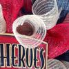 Fire Fighter Real Heroes Don't Wear Capes Deco Mesh Wreath. Available in 24 inch and 28 inch diameters. view 3