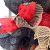 Fire Fighter Real Heroes Don't Wear Capes Deco Mesh Wreath. Available in 24 inch and 28 inch diameters. view 4