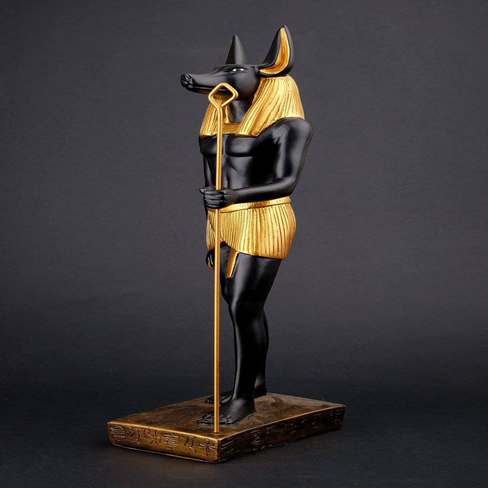 A unique ancient Egyptian statue of Anubis Jackal God of afterlife and mummification unique large gold and black hand painted. made in Egypt.