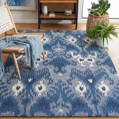 SAFAVIEH Ikat Collection Area Rug - 5' x 8', Blue & Ivory, Handmade Bohemian Wool, Ideal for High Traffic Areas in Living Room, Bedroom (IKT652M)