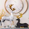2PCS carved elk statue resin ornaments, Christmas reindeer fortune seeking decoration modern retro art standing and sitting posture, applicable to living room and bedroom (3D geometric white) view 3