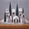 Mark Feldstein & Associates Holiday Wreath Village with Trees, White Unglazed Porcelain LED Christmas Figurines, 18 Piece Set view 2