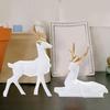 1 Pair Reindeer Sculpture Resin Elk Deer Statue Animal Deer Ornaments Collection Tabletop Ornament for Christmas Table Living Room Decorations White view 3