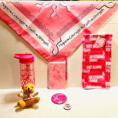 SL2Y- Breast Cancer 7pc Gift Set. Breast Cancer Themed Items (1) Water Bottle (1) Mini Teddy bear (1) Decor Towel (1) Note Tablet wpen (1) Hope, Courage, Faith, Strength Scarf (1) Button (1) magnet.