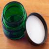 1 oz Green Glass Thick Wall Balm Jars with Black Smooth Foam Lined Lids (12 Pack) view 4