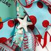 Santa on Paddle Board Coastal, Beach, Nautical Santa Christmas Wreath, Sand Dollar, Starfish, Seashells & Nautical Rope Knots, Bow view 4