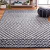 SAFAVIEH Abstract Collection Accent Rug - 3' x 5', Ivory & Navy, Handmade Wool, Ideal for High Traffic Areas in Entryway, Living Room, Bedroom (ABT203N) view 1