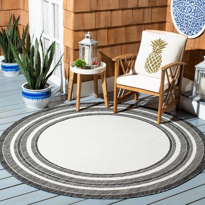 SAFAVIEH Washable Rug Outdoor Courtyard Collection - 5'3" Round, Ivory & Black, Non-Shedding & Easy Cleaning, Ideal for Patio, Backyard, Mudroom (CY8475-53712)
