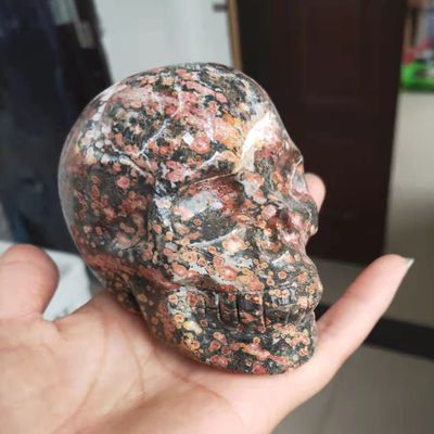HXSCOO 1PC 500-600G Natural Flower Leopard Print Quartz Crystal Hand Carved Skull Carving Reiki Healing Skulls for Decorate