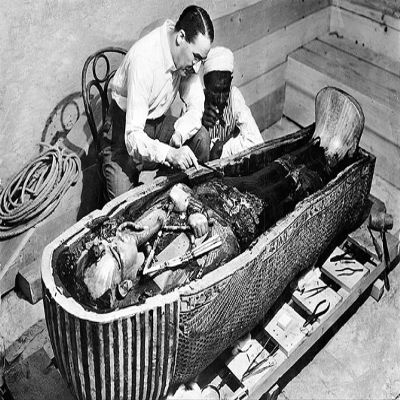 24x36 gallery poster, Howard Carter examining the innermost coffin of Tutankhamun, King Tut