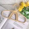 CIYODO Rainbow Rattan Baby Clothes Hanger Compact Kids Organizer for Infant Clothing Nursery Closet Storage view 2