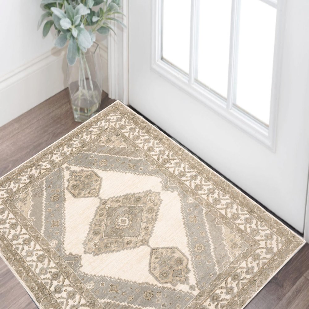 2' x 3' Beige and Ivory Oriental Power Loom Area Rug