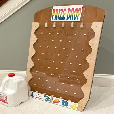 Elegant, Portable Prize Drop Game for Trade Shows, Carnivals, Parties etc. Made of Wood that Produces the Distinct Plink Sound. Full Accessories. 31.5 x 18 in