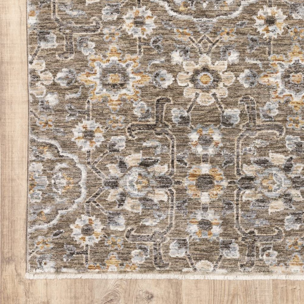 10' X 13' Grey and Tan Floral Power Loom Stain Resistant Area Rug with Fringe