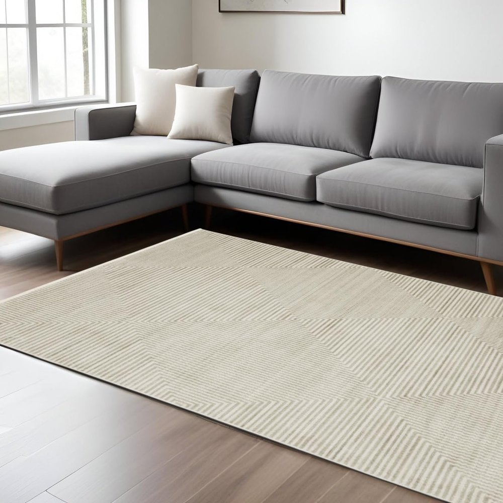 10' X 13' Ivory Beige Taupe and Tan Geometric Power Loom Stain Resistant Area Rug with Fringe