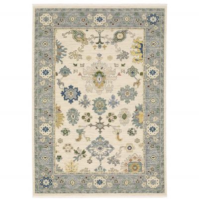 10' X 13' Ivory Blue Grey Teal Gold Green and Rust Oriental Power Loom Stain Resistant Area Rug with Fringe