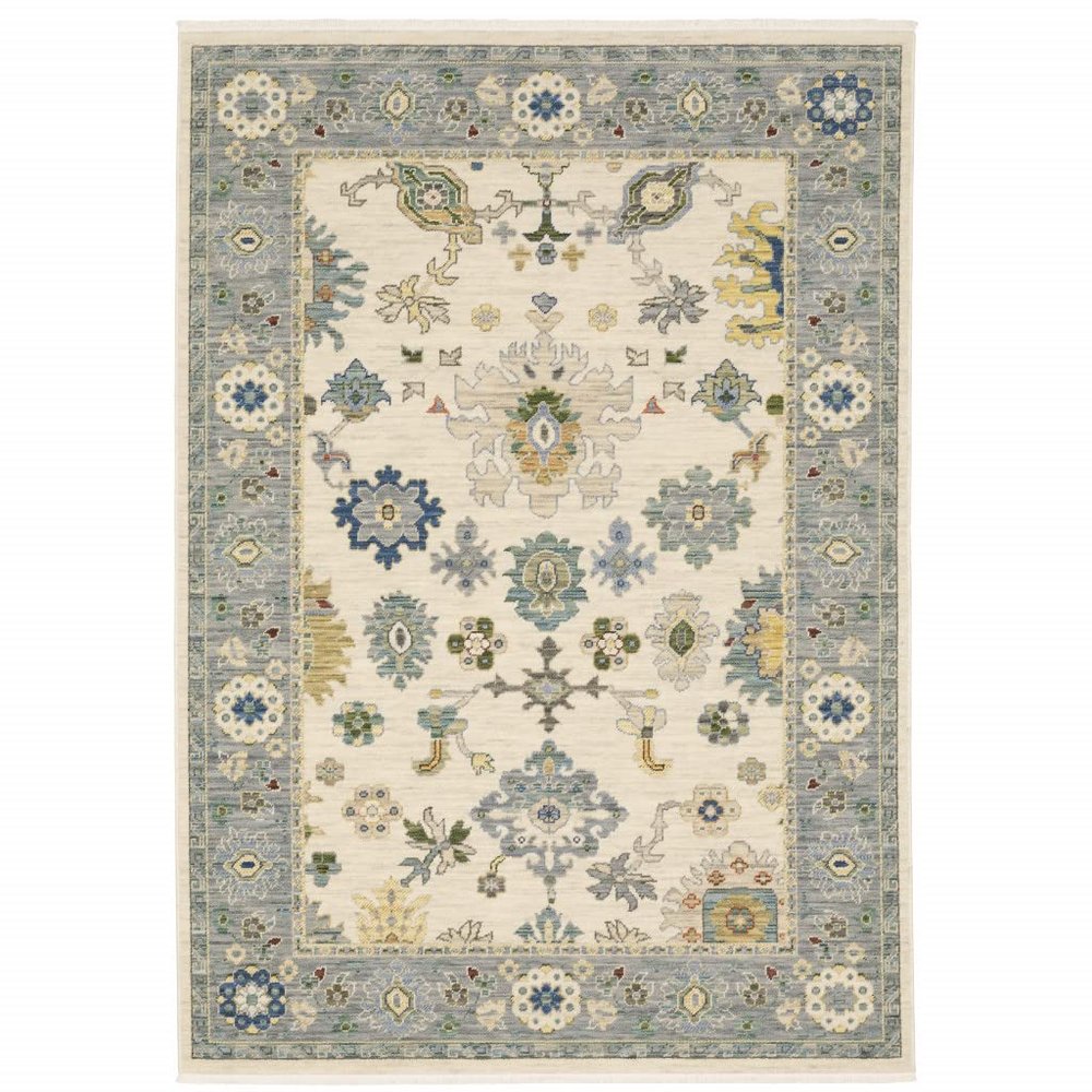 10' X 13' Ivory Blue Grey Teal Gold Green and Rust Oriental Power Loom Stain Resistant Area Rug with Fringe