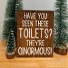Interesting Wooden Sign Have You seen These Toilets? They're Ginormous! - Buddy The elf Sign - Funny Bathroom Decor- Elf Bathroom Shelf Quote Wooden Signs with Sayings 8x8 Inch view 1