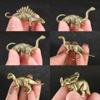 6Pcs Set Brass Jurassic Dinosaur Model Miniature Figurines,Stegosaurus Diplodocus Monocolonus Velociraptor Diplodocus Triceratops Statue Sculpture Home Desktop Sand Table Car Decor Study Paperweight view 2