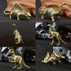 6Pcs Set Brass Jurassic Dinosaur Model Miniature Figurines,Stegosaurus Diplodocus Monocolonus Velociraptor Diplodocus Triceratops Statue Sculpture Home Desktop Sand Table Car Decor Study Paperweight view 4