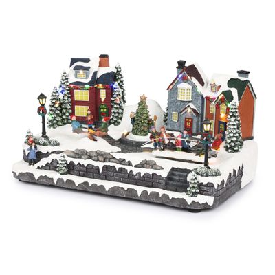 Alpine Corporation 9" Tall Indoor Animated Children Playing in Christmas Village with 26 Multicolor LED Lights, Tabletop Christmas Decoration