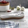Kamenstein Ceramic and Cork Spoon Rest for Kitchen Counter and Stovetop Protection from Spills and Scratches, natural cork and white ceramic view 3