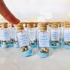 Kseniya Revta Custom Birthday Party Favors for Guests - Personalized 40th, 50th, 60th, 70th, 80th Bday Souvenirs - Quinceanera and Sweet 16 Favor Pack (Sand and Shells, Set of 100 bottles) view 1