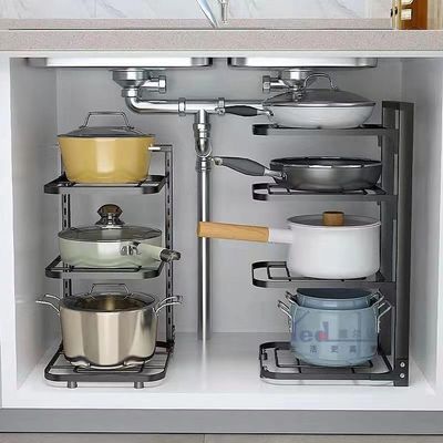 Pot Racks are specifically for pots and Pans, and There are Storage Shelves Under Stainless Steel Shelves in The Kitchen, Multi-Layer Household cabinets, Layered