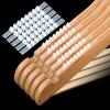 Bremorou 100 Pcs Non-Slip Hanger Grips for Wood Hangers - Clear Adhesive Clothes Strips Grippers with Fins - Rubber Non-Slip Hanging Accessories for Home Stores Use view 1