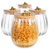 Healeved Glass Canisters with Airtight Lids 4-Pack 5.3 Inch Petal Jars for Food Storage Kitchen Pantry Spice Tea and Honey Containers view 1