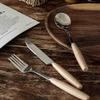 Beige Silverware Set for 16, 48 Piece Wooden handles Stainless Steel Tableware in Ergonomic Design Size and Weight Food Grade Stainless Steel Including Steak Knife Fork and Spoon for Christmas view 4