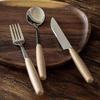 Beige Silverware Set for 12, 36 Piece Wooden handles Stainless Steel Tableware in Ergonomic Design Size and Weight Food Grade Stainless Steel Including Steak Knife Fork and Spoon for Christmas view 2